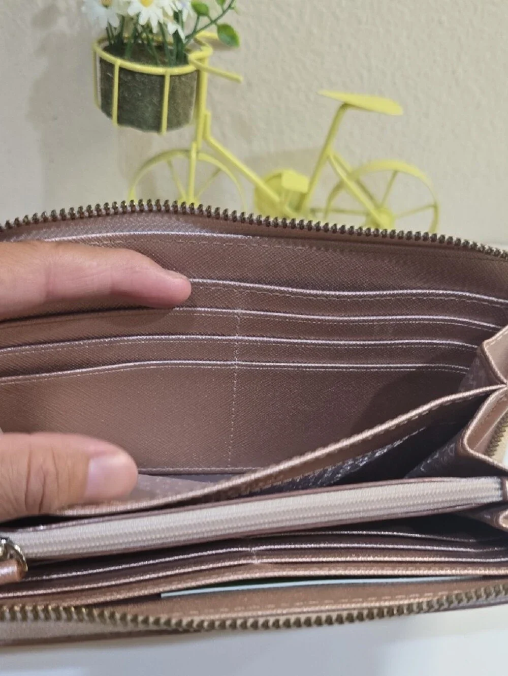 kate spade metallic rose gold zip-around continental wallet